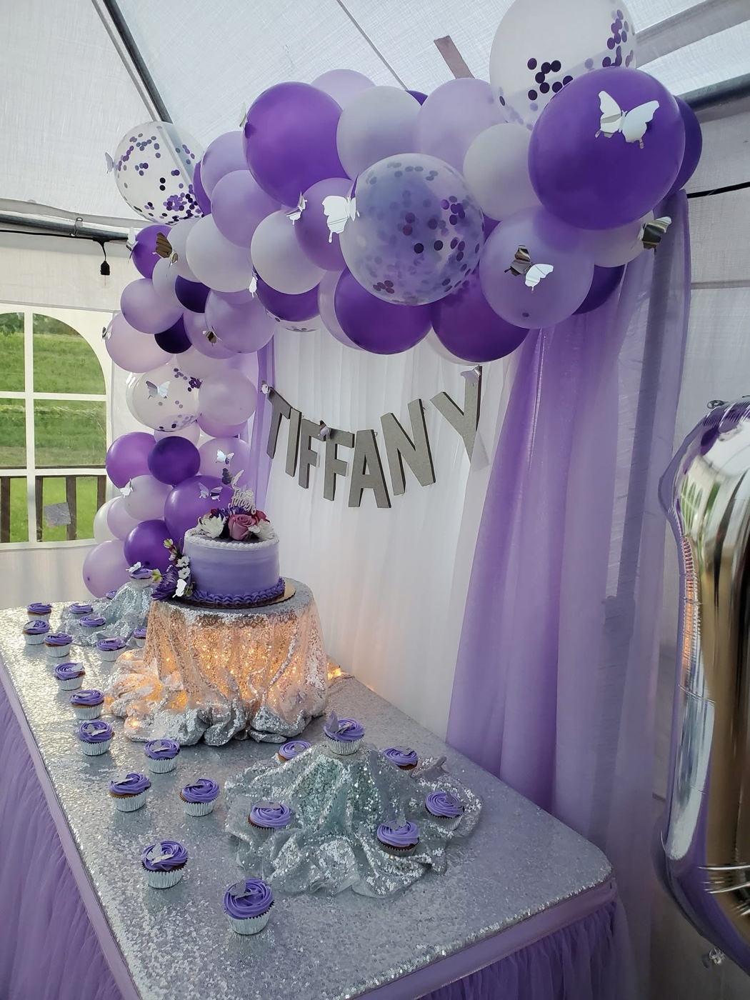 Outdoor wedding reception table with elegant floral details